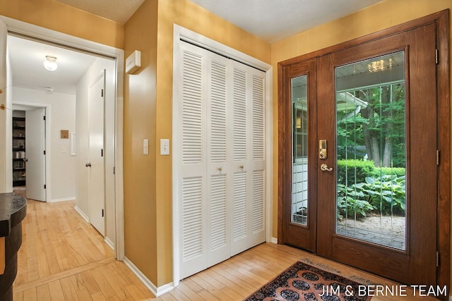 8518 146th Ave, West Olive, MI 49460 - foyer with light wood-style floors