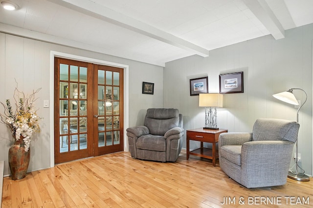 8518 146th Ave, West Olive, MI 49460 - sitting room with beam ceiling, french doors, and wood-type flooring