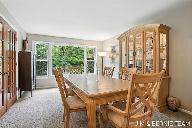 8518 146th Ave, West Olive, MI 49460 - dining room with light colored carpet and baseboards