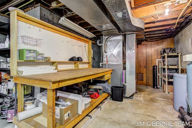 8518 146th Ave, West Olive, MI 49460 - unfinished basement featuring a workshop area and heating unit