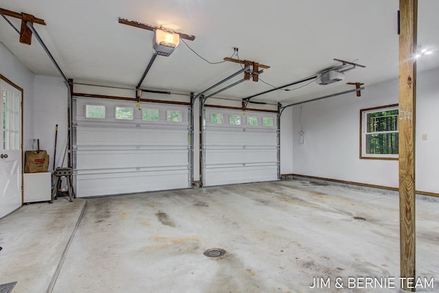 8518 146th Ave, West Olive, MI 49460 - garage with a garage door opener