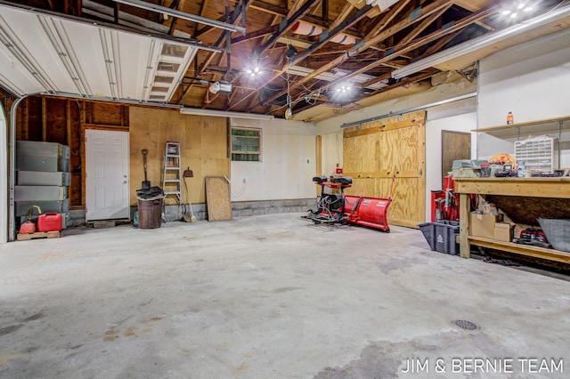8518 146th Ave, West Olive, MI 49460 - garage featuring a garage door opener