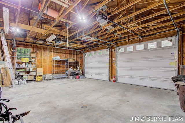 8518 146th Ave, West Olive, MI 49460 - garage featuring a garage door opener