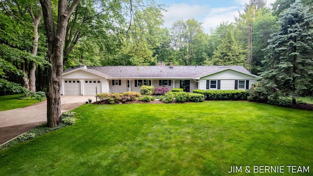 8518 146th Ave, West Olive, MI 49460 - ranch-style house featuring driveway, a chimney, an attached garage, and a front yard