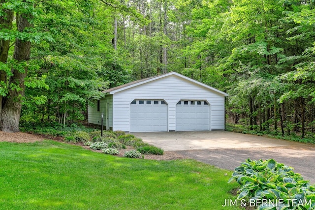 8518 146th Ave, West Olive, MI 49460 - detached garage featuring a wooded view