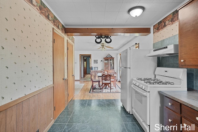 11956 Berrigan Ave NE, Cedar Springs, MI 49319 - kitchen featuring white gas range oven, exhaust hood, tasteful backsplash, and a ceiling fan