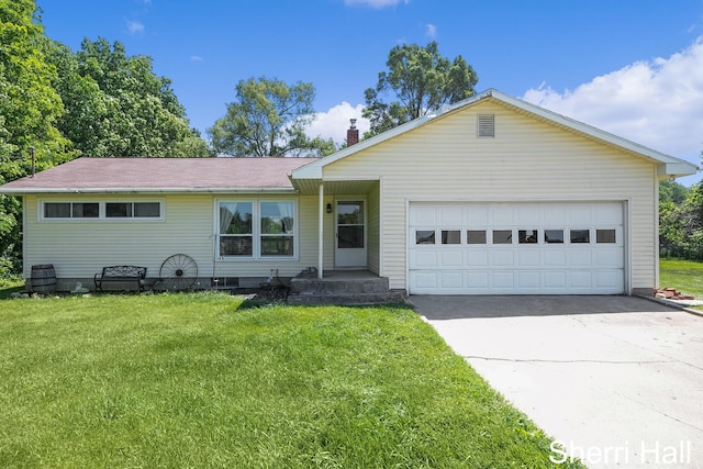 11956 Berrigan Ave NE, Cedar Springs, MI 49319 - single story home featuring a front yard, concrete driveway, and a garage