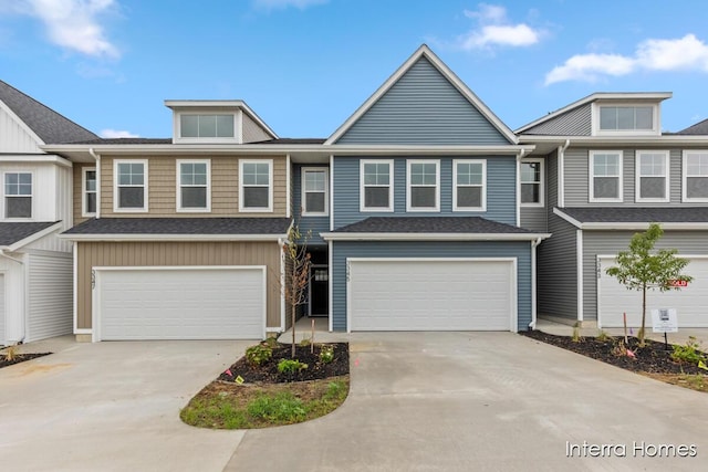 3345 Kings River St SW Unit 38, Wyoming, MI 49418 - multi unit property featuring a garage and driveway