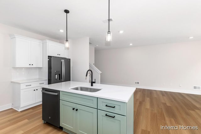 3345 Kings River St SW Unit 38, Wyoming, MI 49418 - kitchen featuring stainless steel appliances, light wood-style floors, white cabinets, light countertops, and recessed lighting