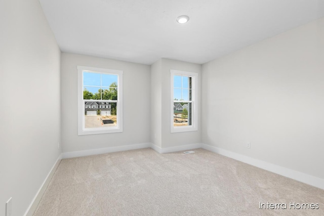 3345 Kings River St SW Unit 38, Wyoming, MI 49418 - empty room featuring carpet floors and baseboards