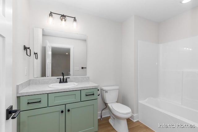 3345 Kings River St SW Unit 38, Wyoming, MI 49418 - bathroom with wood finished floors, vanity, and shower / tub combination