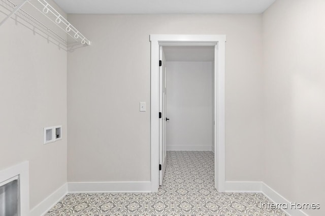 3345 Kings River St SW Unit 38, Wyoming, MI 49418 - laundry area with washer hookup and light tile patterned floors