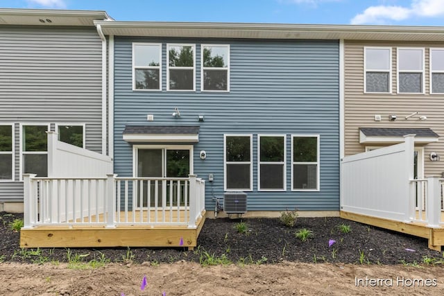 3345 Kings River St SW Unit 38, Wyoming, MI 49418 - rear view of property with a deck