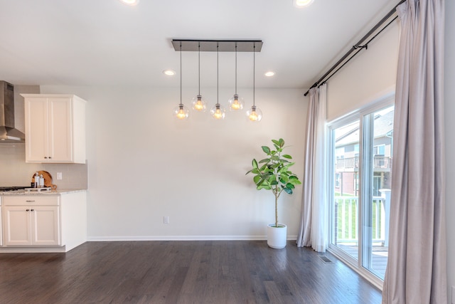 2763 Polson St, Ann Arbor, MI 48105 - unfurnished dining area featuring dark wood-style flooring and recessed lighting