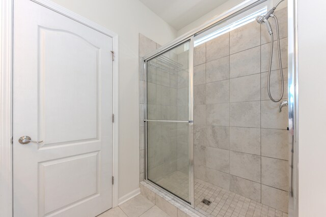 2763 Polson St, Ann Arbor, MI 48105 - bathroom with a shower stall and tile patterned floors