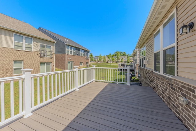 2763 Polson St, Ann Arbor, MI 48105 - wooden terrace featuring a residential view, a lawn, and cooling unit