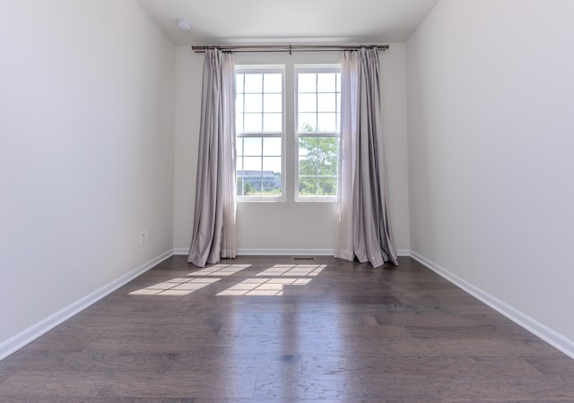2763 Polson St, Ann Arbor, MI 48105 - spare room featuring dark wood-type flooring and a smoke detector