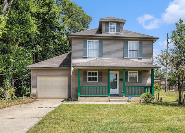 885 Broadway, Benton Harbor, MI 49022 - view of front of house featuring an attached garage, concrete driveway, a porch, and a front lawn