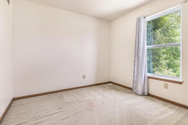 885 Broadway, Benton Harbor, MI 49022 - unfurnished room with carpet floors and baseboards