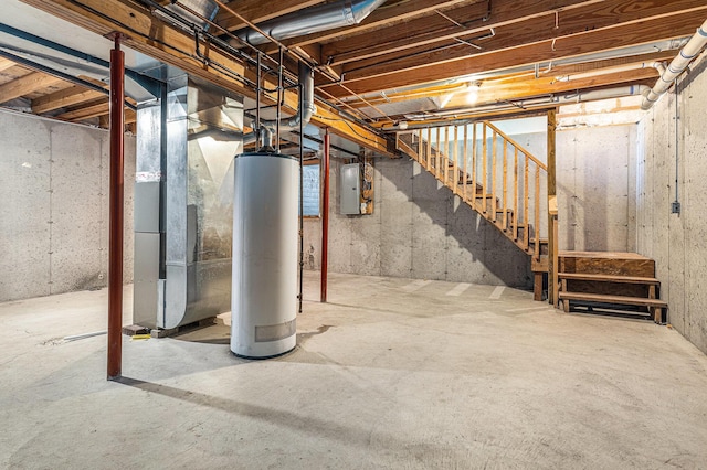 885 Broadway, Benton Harbor, MI 49022 - unfinished basement with water heater, stairs, and heating unit