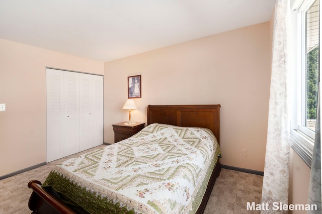 230 S State St Unit 83, Zeeland, MI 49464 - carpeted bedroom with a closet and baseboards
