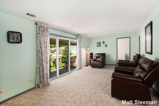 230 S State St Unit 83, Zeeland, MI 49464 - carpeted living area featuring baseboards