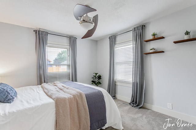 6116 Eastern Ave SE, Grand Rapids, MI 49508 - bedroom featuring a ceiling fan and light colored carpet
