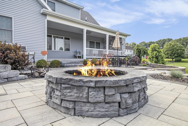 46140 Finch St, Mattawan, MI 49071 - view of patio with an outdoor fire pit