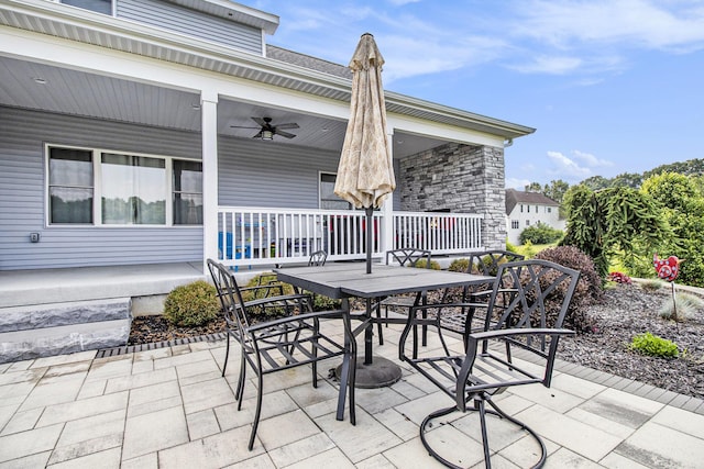 46140 Finch St, Mattawan, MI 49071 - porch with outdoor dining space and a ceiling fan