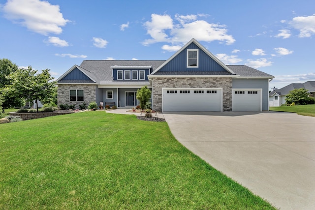 46140 Finch St, Mattawan, MI 49071 - craftsman-style home with concrete driveway, a garage, a front lawn, and stone siding