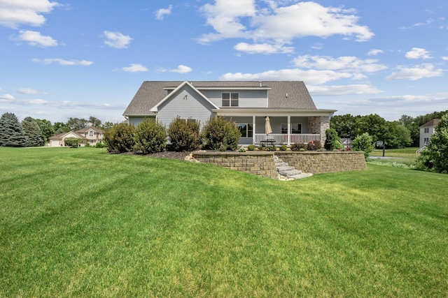 46140 Finch St, Mattawan, MI 49071 - back of property featuring a lawn, a porch, and a shingled roof
