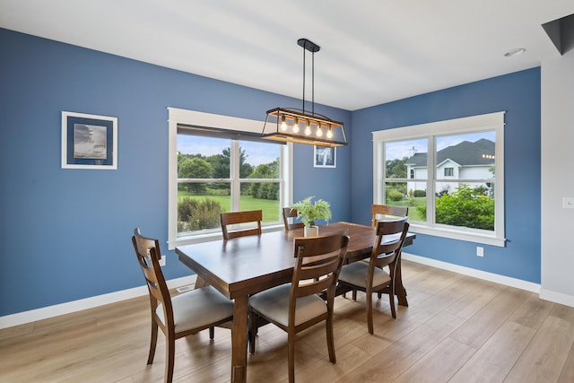 46140 Finch St, Mattawan, MI 49071 - dining space with light wood-style floors and a chandelier