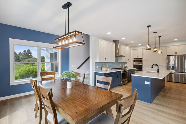 46140 Finch St, Mattawan, MI 49071 - dining area featuring light wood-style flooring, recessed lighting, and a chandelier