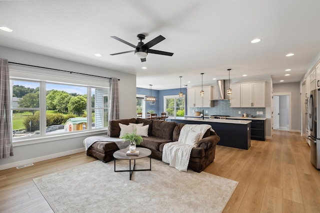 46140 Finch St, Mattawan, MI 49071 - living area featuring recessed lighting, light wood finished floors, and a ceiling fan