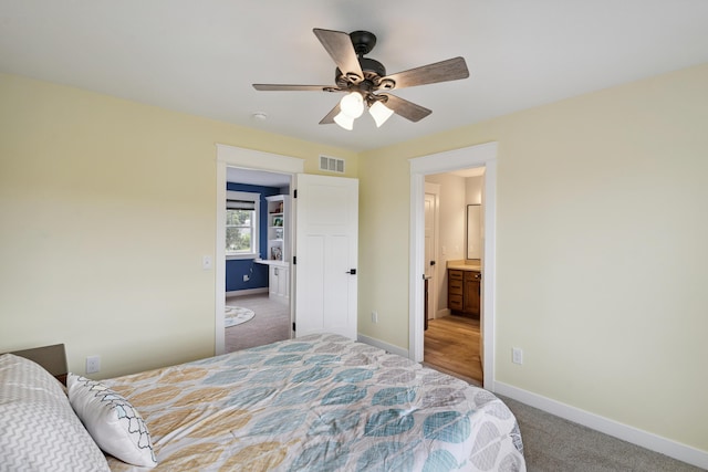 46140 Finch St, Mattawan, MI 49071 - carpeted bedroom with a ceiling fan and connected bathroom