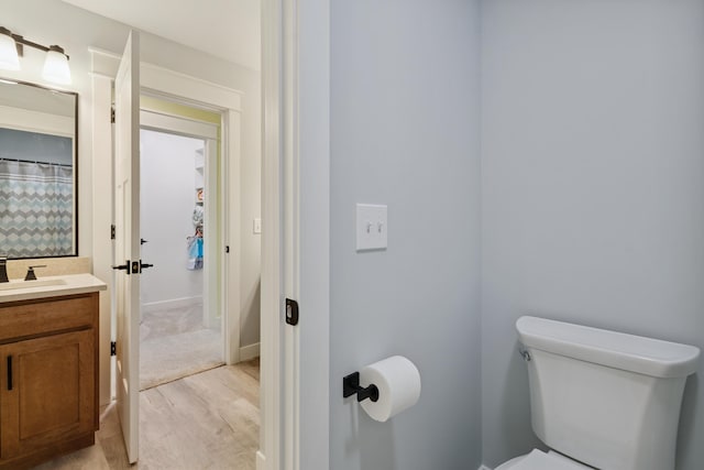46140 Finch St, Mattawan, MI 49071 - full bathroom with vanity and wood finished floors
