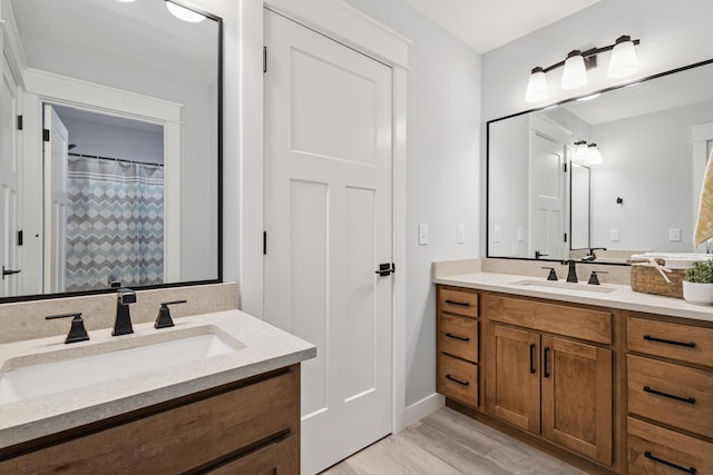 46140 Finch St, Mattawan, MI 49071 - bathroom featuring vanity and wood finished floors