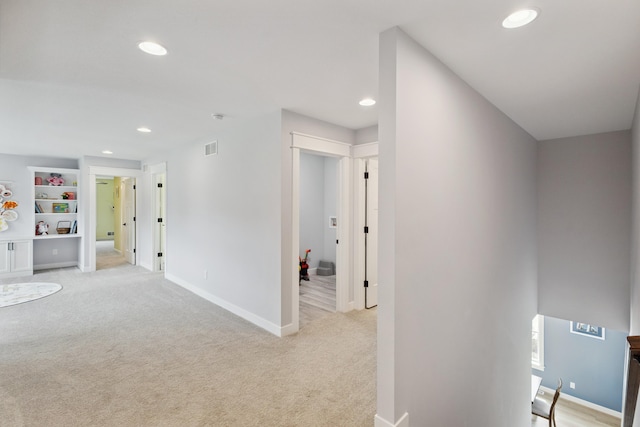 46140 Finch St, Mattawan, MI 49071 - hallway featuring light colored carpet, recessed lighting, and built in shelves