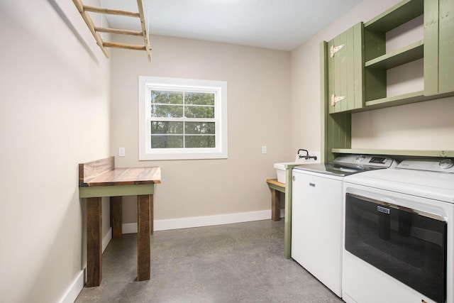 17756 Brad Ln, Three Rivers, MI 49093 - laundry room featuring washer and clothes dryer and cabinet space