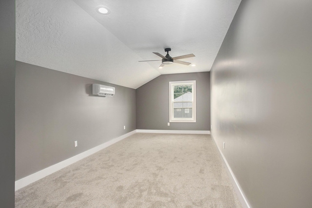 17756 Brad Ln, Three Rivers, MI 49093 - bonus room featuring an AC wall unit, ceiling fan, vaulted ceiling, and carpet floors
