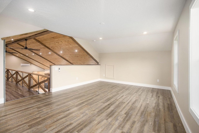 17756 Brad Ln, Three Rivers, MI 49093 - unfurnished living room featuring wood finished floors, recessed lighting, and vaulted ceiling