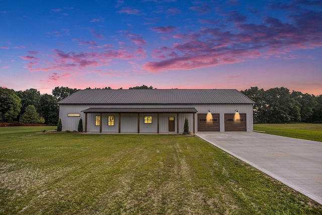 17756 Brad Ln, Three Rivers, MI 49093 - modern farmhouse featuring driveway, a lawn, a porch, and an attached garage