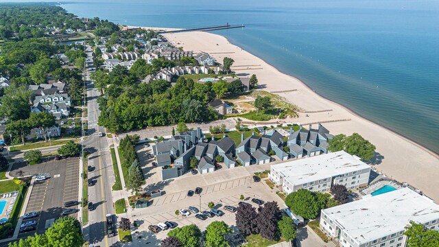 225 N Shore Dr Unit 302, South Haven, MI 49090 - aerial view of property and surrounding area with waterfront with a beach
