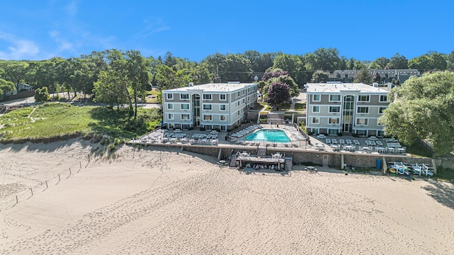 225 N Shore Dr Unit 302, South Haven, MI 49090 - aerial view of a pool and a tree filled landscape