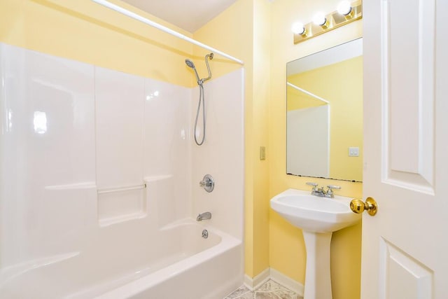 2208 Parkview Ave, Kalamazoo, MI 49008 - bathroom with shower / tub combination and baseboards
