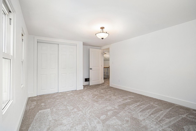 802 Clinton St, Marshall, MI 49068 - unfurnished bedroom with carpet flooring and a closet