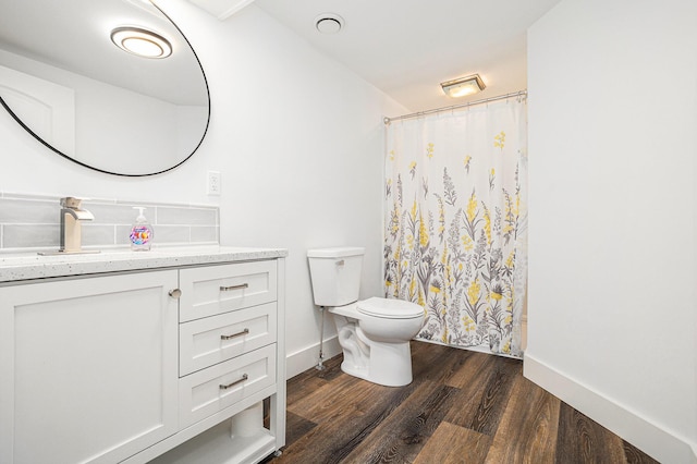 802 Clinton St, Marshall, MI 49068 - full bathroom featuring wood finished floors, vanity, and curtained shower