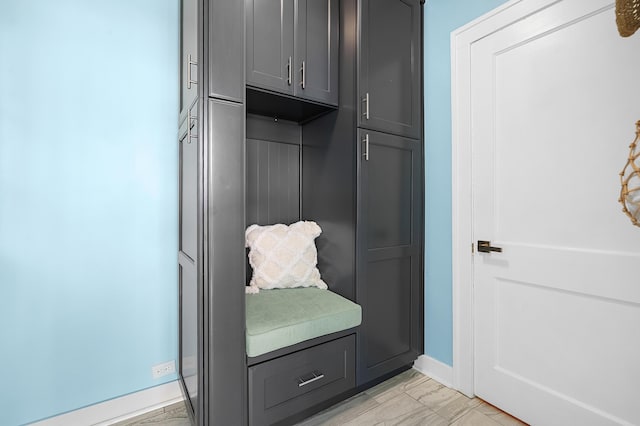 510 Wayne St, Saint Joseph, MI 49085 - mudroom featuring baseboards and light marble finish floors