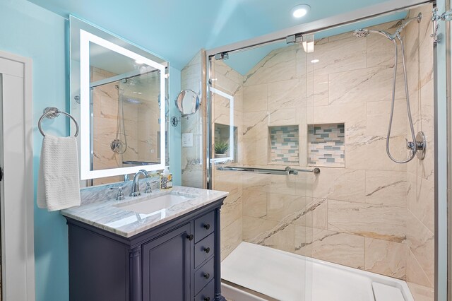 510 Wayne St, Saint Joseph, MI 49085 - bathroom with a marble finish shower, vanity, and recessed lighting