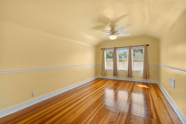 510 Wayne St, Saint Joseph, MI 49085 - empty room featuring vaulted ceiling, wood-type flooring, and a ceiling fan